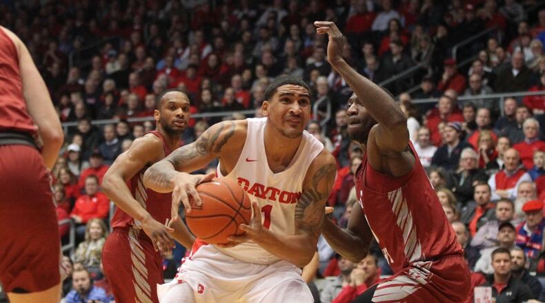 Dayton’s Obi Toppin looks for a shot against Saint Joseph’s on Tuesday, Jan. 29, 2019, at UD Arena. David Jablonski/Staff