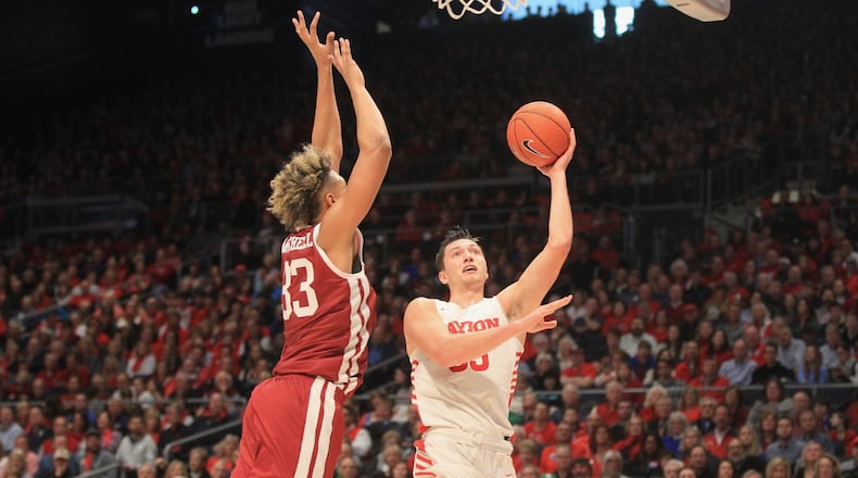 Dayton’s Ryan Mikesell puts up a shot vs. Massachusetts on Jan. 11, 2020, at UD Arena. David Jablonski/STAFF