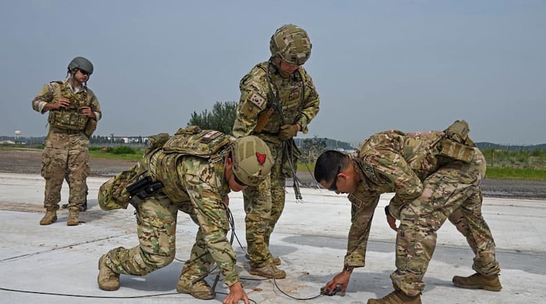 The Air Force Explosive Ordnance Disposal team, at work. (Air Force photo)