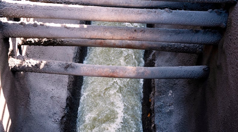 Raw sewage flows to an interceptor pipe along the C&O Canal beside the Potomac River in Cabin John, Md., Saturday, March 14, 2026. (AP Photo/Cliff Owen)