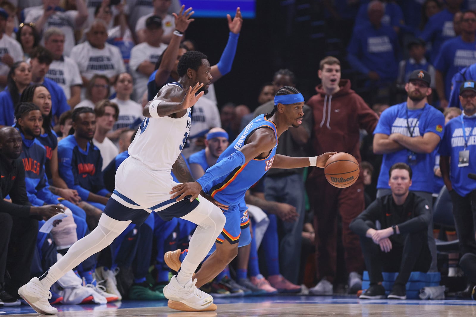 Oklahoma City Thunder guard Shai Gilgeous-Alexander (2), right, works toward the basket as Minnesota Timberwolves forward Julius Randle (30) defends during the first half of Game 5 of the Western Conference finals of the NBA basketball playoffs, Wednesday, May 28, 2025, in Oklahoma City. (AP Photo/Nate Billings)