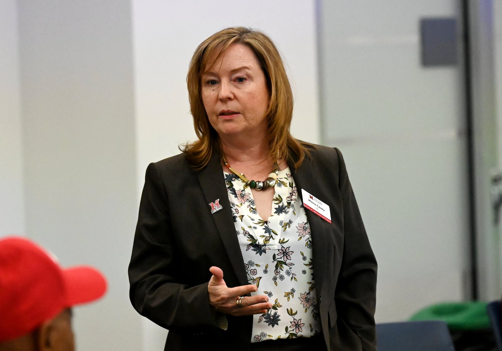 Moira Casey, interim dean of College of Liberal Arts and Applied Science, talks about the polytechnic program Miami University Hamilton will launch in 2027 during an open house on Tuesday, Oct. 28, 2025, concerning the campus's expansion. MICHAEL D. PITMAN/STAFF
