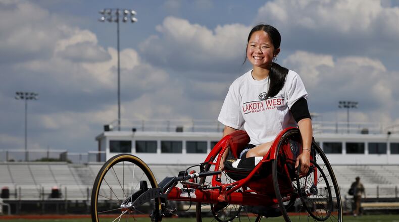 Jun McKnight 15, a sophomore at Lakota West, will compete as a seated athlete in the 100m, 400m and 800m races at the OHSAA state track meet. NICK GRAHAM/STAFF
