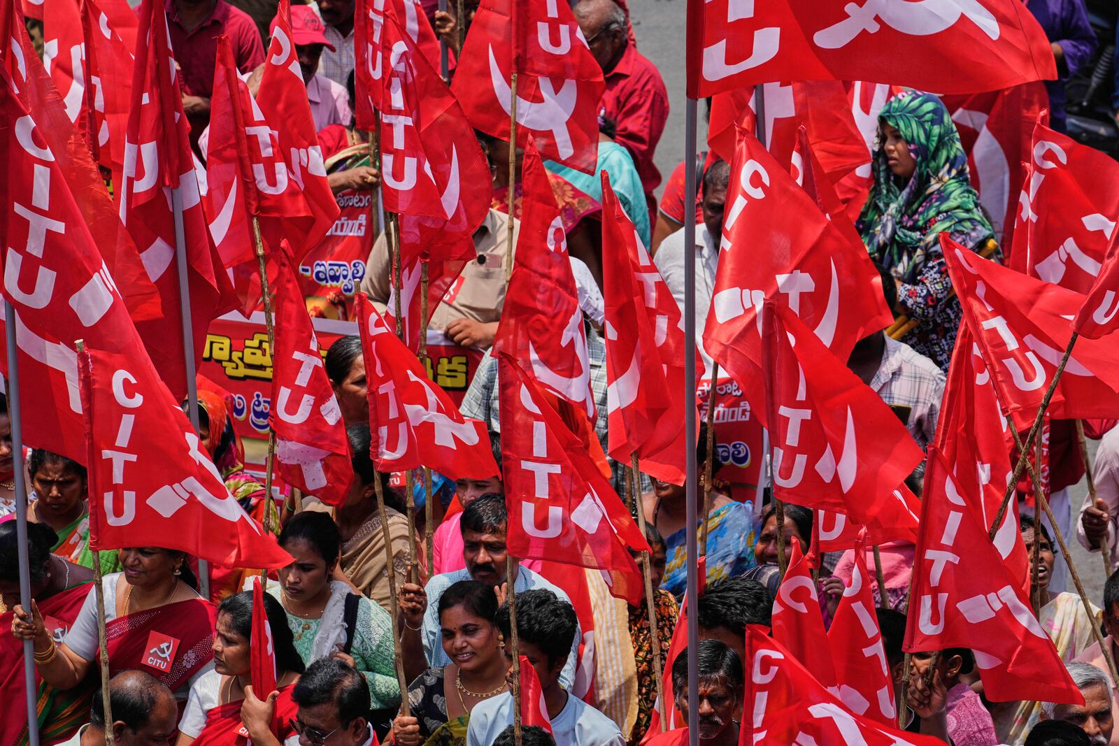 Members of Centre of India Trade Unions (CITU) participate in a rally to mark May Day in Hyderabad, India, Thursday, May 1, 2025. (AP Photo/Mahesh Kumar A.)