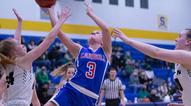 Carroll junior Sarah Ochs tries to score against Badin Friday night in the Patriots' 45-41 victory in the Division II regional final at Springfield High School. Jeff Gilbert/CONTRIBUTED