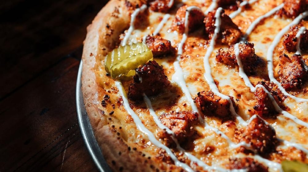 Columbus-based Mikey's Late Night Slice will open in Dayton Jan. 30. The pizza joint serves 18-inch New York-style pizza by-the-slice and whole pie. CONTRIBUTED