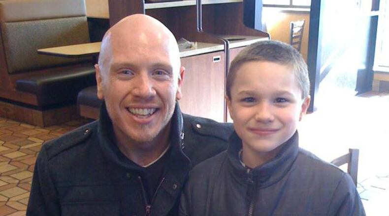 Brian Buttrey and his son Zach in 2010, before Zach was officially adopted. CONTRIBUTED