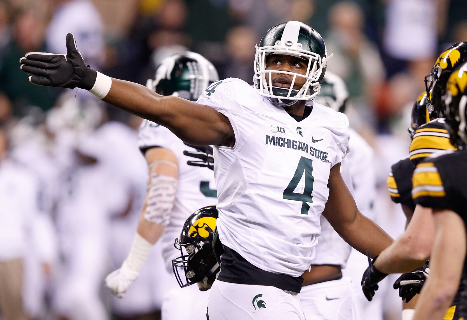 INDIANAPOLIS, IN - DECEMBER 05: Malik McDowell #4 of the Michigan State Spartans reacts during the game against the Iowa Hawkeyes in the Big Ten Championship at Lucas Oil Stadium on December 5, 2015 in Indianapolis, Indiana. (Photo by Joe Robbins/Getty Images)