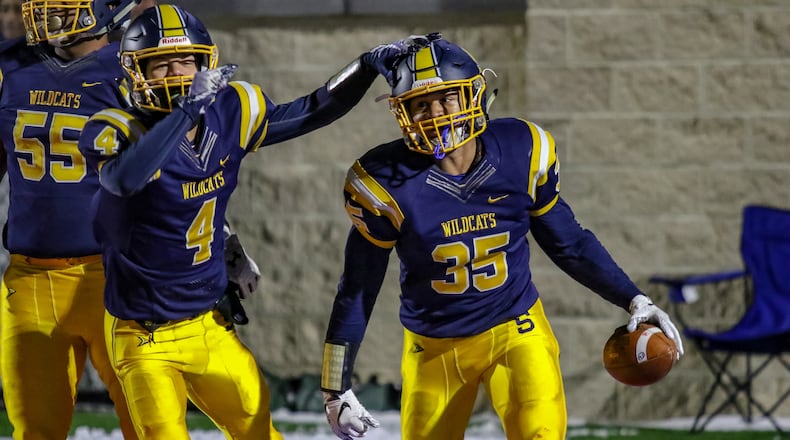 Springfield High School seniors James Wood II and Jeff Tolliver celebrate after a win earlier this season. CONTRIBUTED BY MICHAEL COOPER