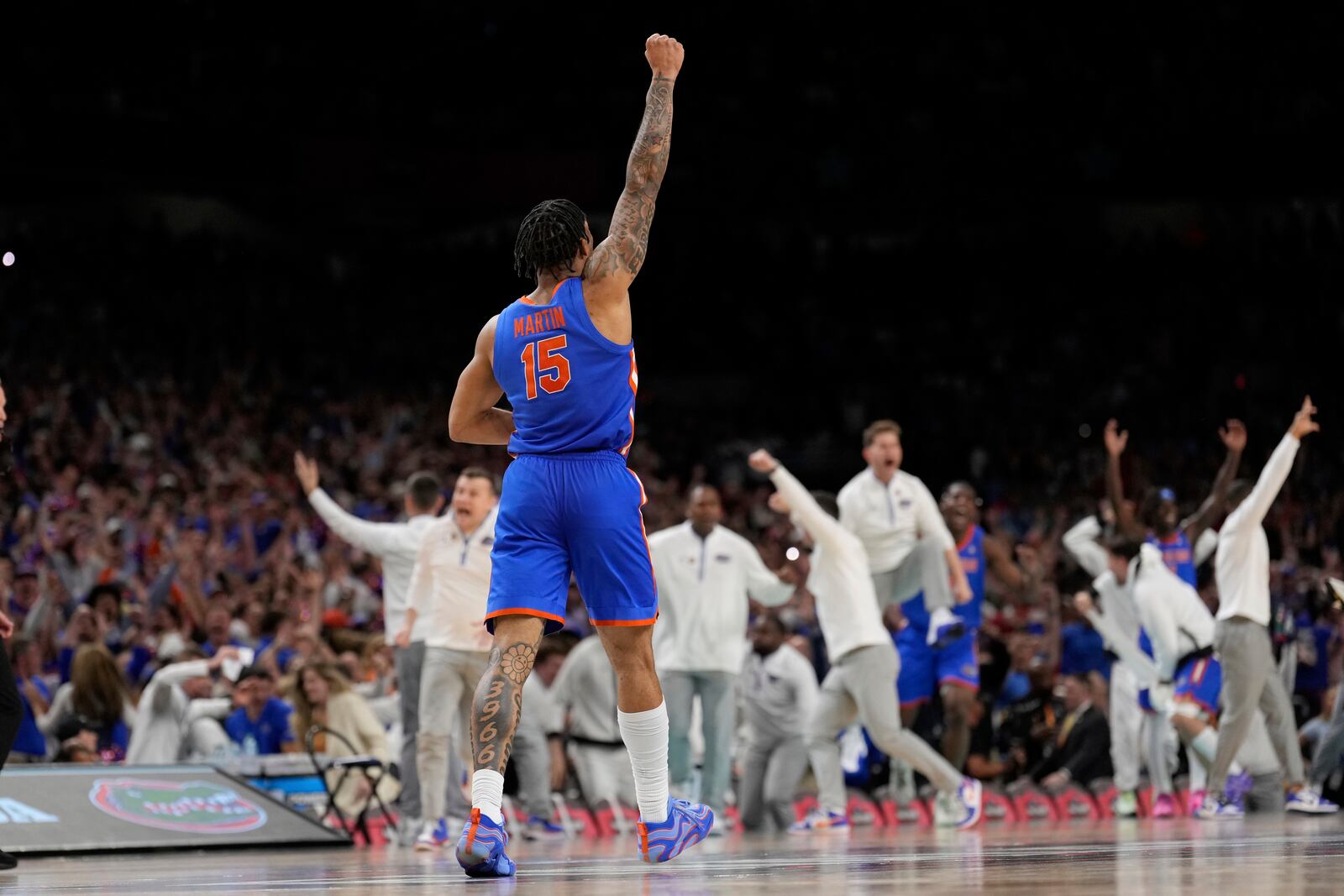 Florida guard Alijah Martin celebrates after their win against the Houston in the national championship at the Final Four of the NCAA college basketball tournament, Monday, April 7, 2025, in San Antonio. (AP Photo/Brynn Anderson)