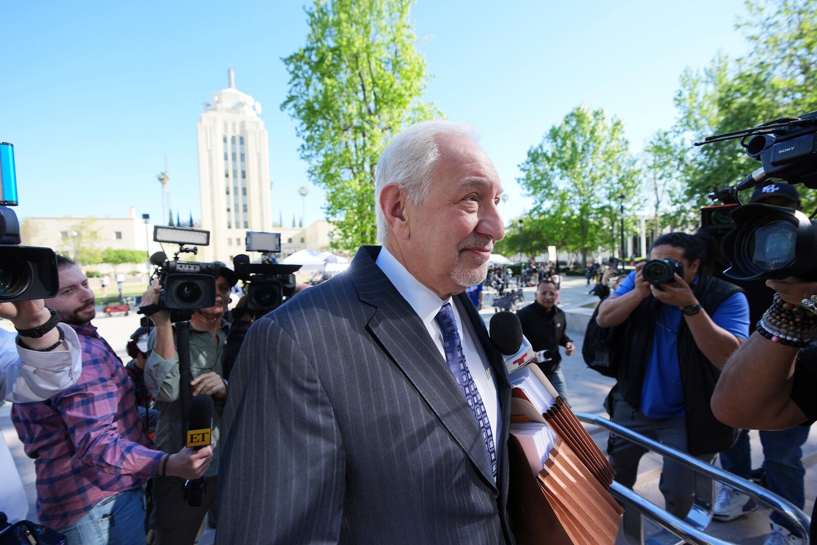 Attorney Mark Geragos arrives for a hearing regarding the case of Erik and Lyle Menendez Friday, April 11, 2025, in Los Angeles. (AP Photo/Damian Dovarganes)