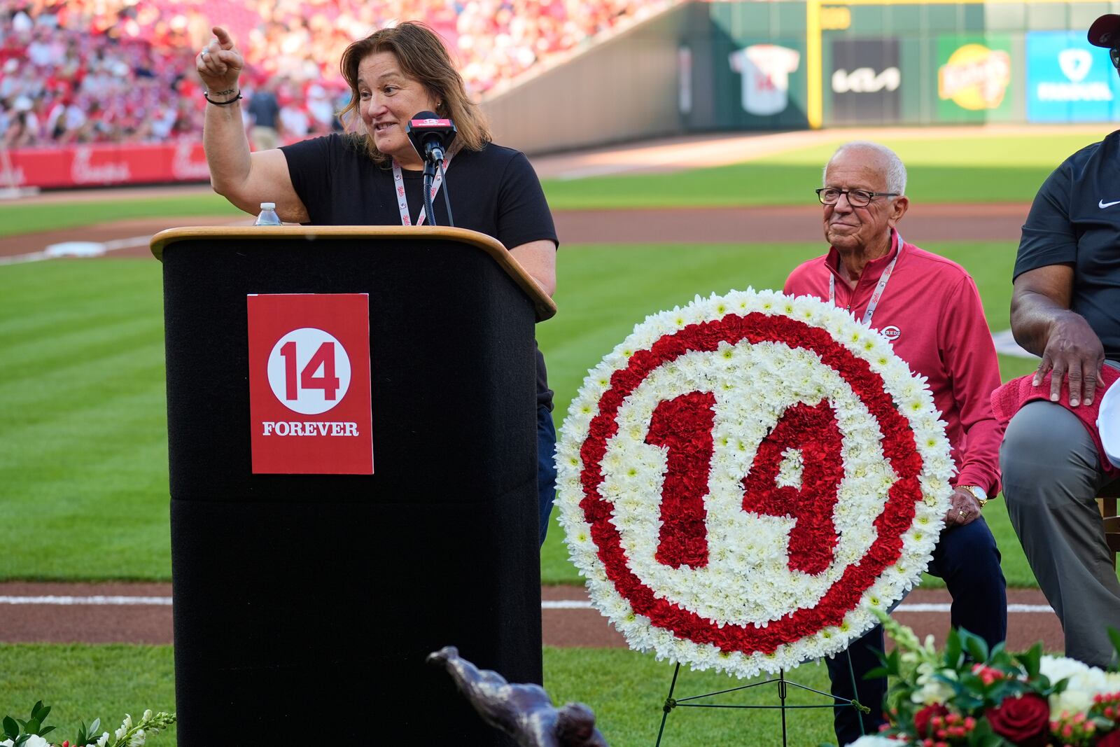 Pete Rose's daughter Fawn Rose speaks during Pete Rose Night events before a baseball game between the Cincinnati Reds and the Chicago White Sox, Wednesday, May 14, 2025, in Cincinnati. (AP Photo/Carolyn Kaster)