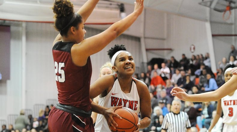 Wayne’s Maya Dunson looks to score against Newark’s Taylor Scott at the Classic In the Country Challenge on Sunday, Jan. 14, 2018. Photo by John Howley/OGBR