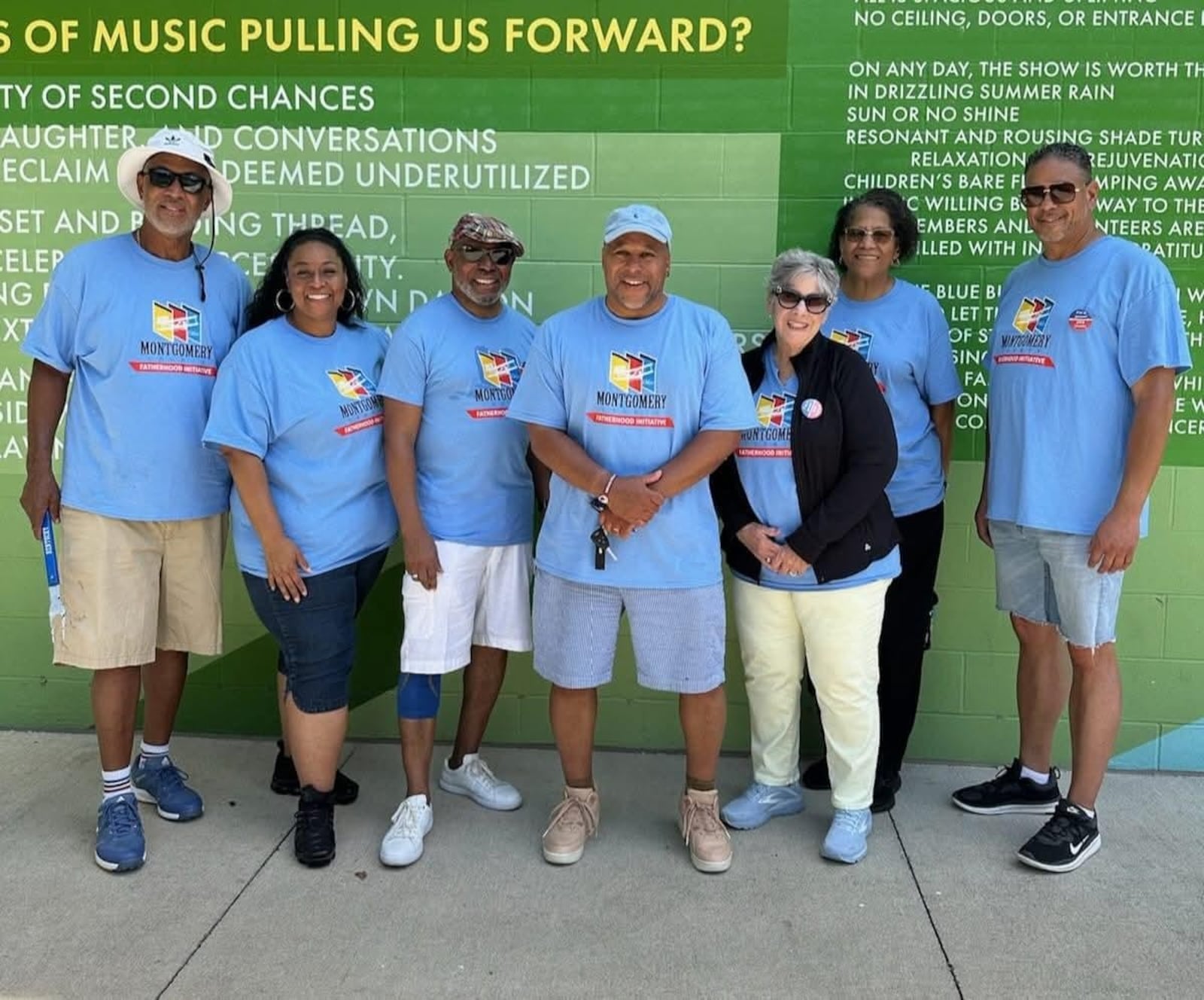 Michael Newsom (center) with the Montgomery County Fatherhood Committee. CONTRIBUTED