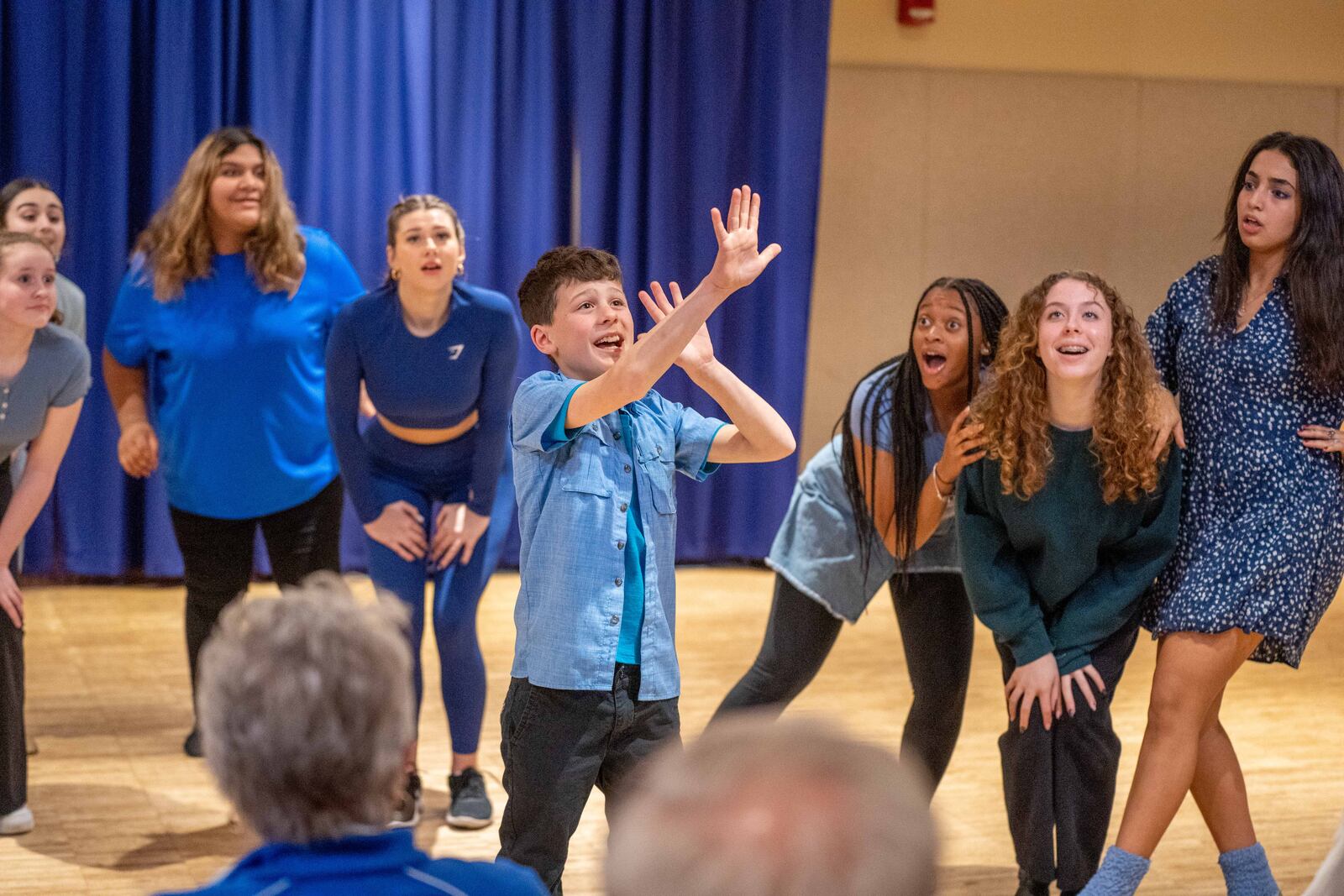The Mersisters gossip with little Flounder (Noah Mullen) about his not-so-secret crush in "She's in Love." PHOTO BY MATT SILVER