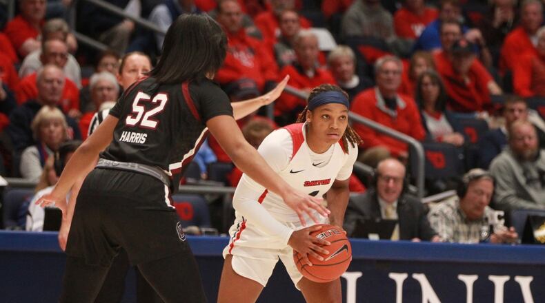 Dayton’s Araion Bradshaw looks to make a pass against South Carolina on Wednesday, Nov. 13, 2019, at UD Arena. David Jablonski/Staff