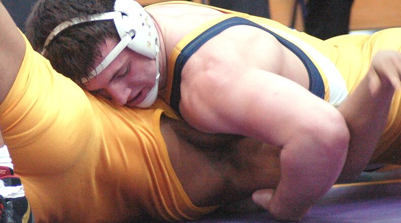 Springfield’s Joe Cochran works for the fall during his 195-pound title match at the GWOC tournament Saturday at Butler High School. Cochran claimed his second title with a fall in 5:33. JOHN CUMMINGS / CONTRIBUTED