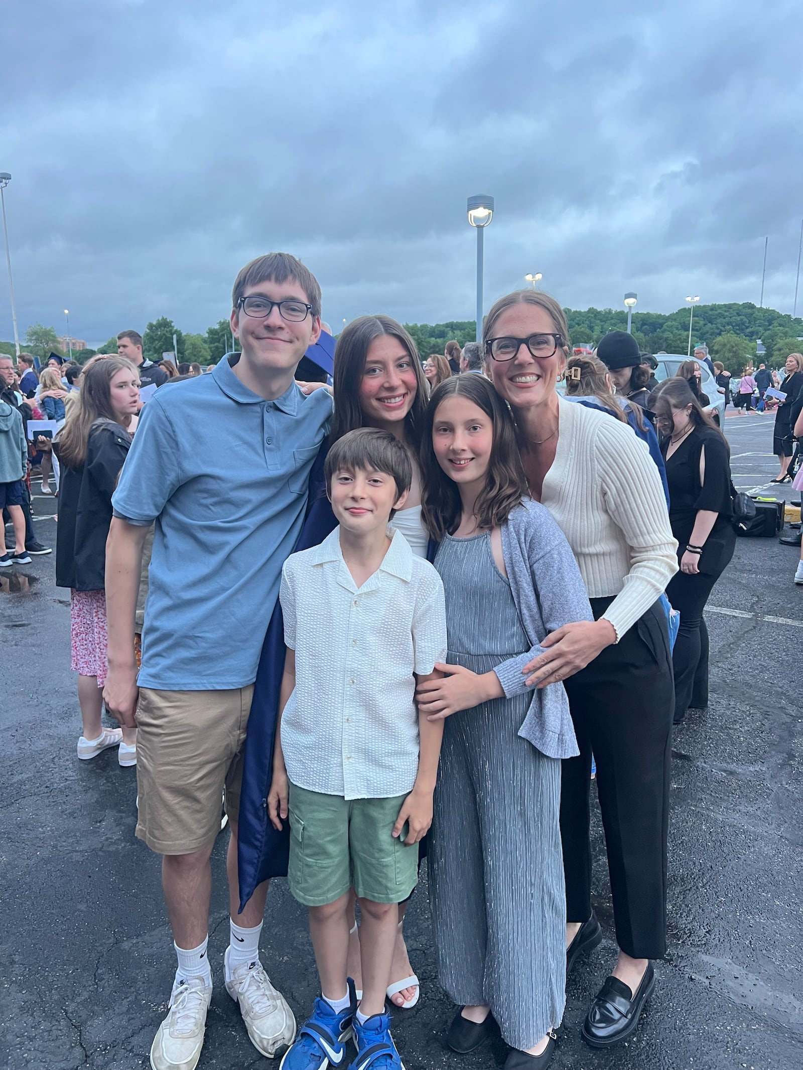 Whitney Kling, a 2001 Oakwood High School graduate and former owner of Top Knot Kitchen, has combined her love for cooking and writing by publishing a weekly “But First, Food” column that appears in the Dayton Daily News. Pictured is Kling (far right) with her children (left to right) Beckett, Crosby, Reed and Blake (CONTRIBUTED PHOTO).