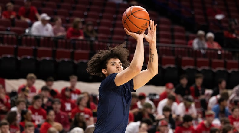 Michigan's George Washington III shoots while warming up before playing against Nebraska in an NCAA college basketball game Saturday, Feb. 10, 2024, in Lincoln, Neb. (AP Photo/Rebecca S. Gratz)