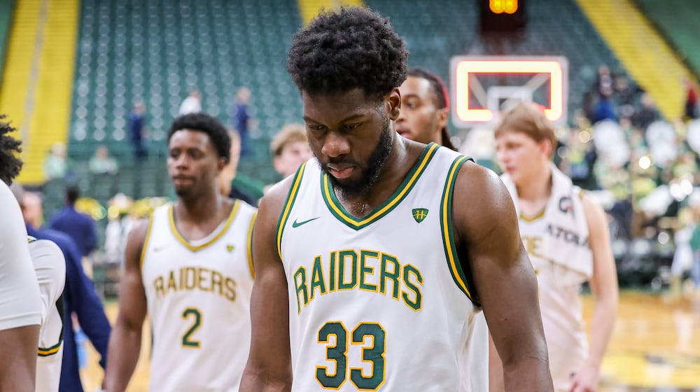 Wright State forward Michael Imariagbe walks out ahead of teammates after a 77-74 loss to Detroit Mercy on Thursday, Feb. 12 at Ervin J. Nutter Center in Fairborn. BRYANT BILLING / STAFF