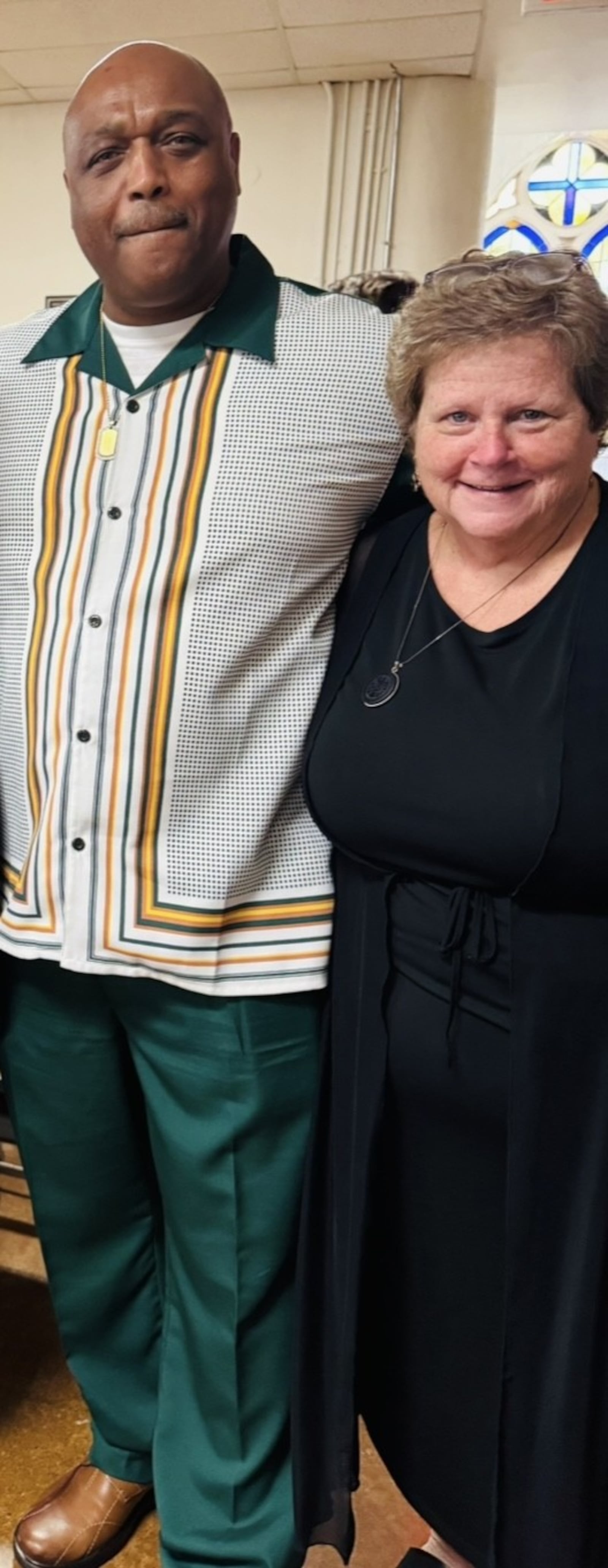 Casey Rollins, the executive director of St. Vincent DePaul, and Brother Mark Muhammad, are helping Haitians in Springfield. CONTRIBUTED