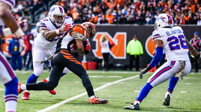 Cincinnati Bengals wide receiver Tyler Boyd is tackled by Buffalo Bills’ Preston Brown during their 16-12 loss to the Buffalo Bills Sunday, Nov. 20 at Paul Brown Stadium in Cincinnati. Woods was injured on the play. NICK GRAHAM/STAFF