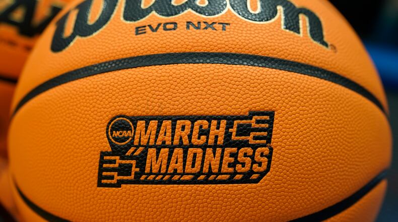 A basketball sits on a rack before a First Four college basketball game between Fairleigh Dickinson and Texas Southern in the NCAA men's basketball tournament, Wednesday, March 15, 2023, in Dayton, Ohio. The 2024 First Four returns to Dayton March 19-20 at UD Arena. (AP Photo/Darron Cummings)