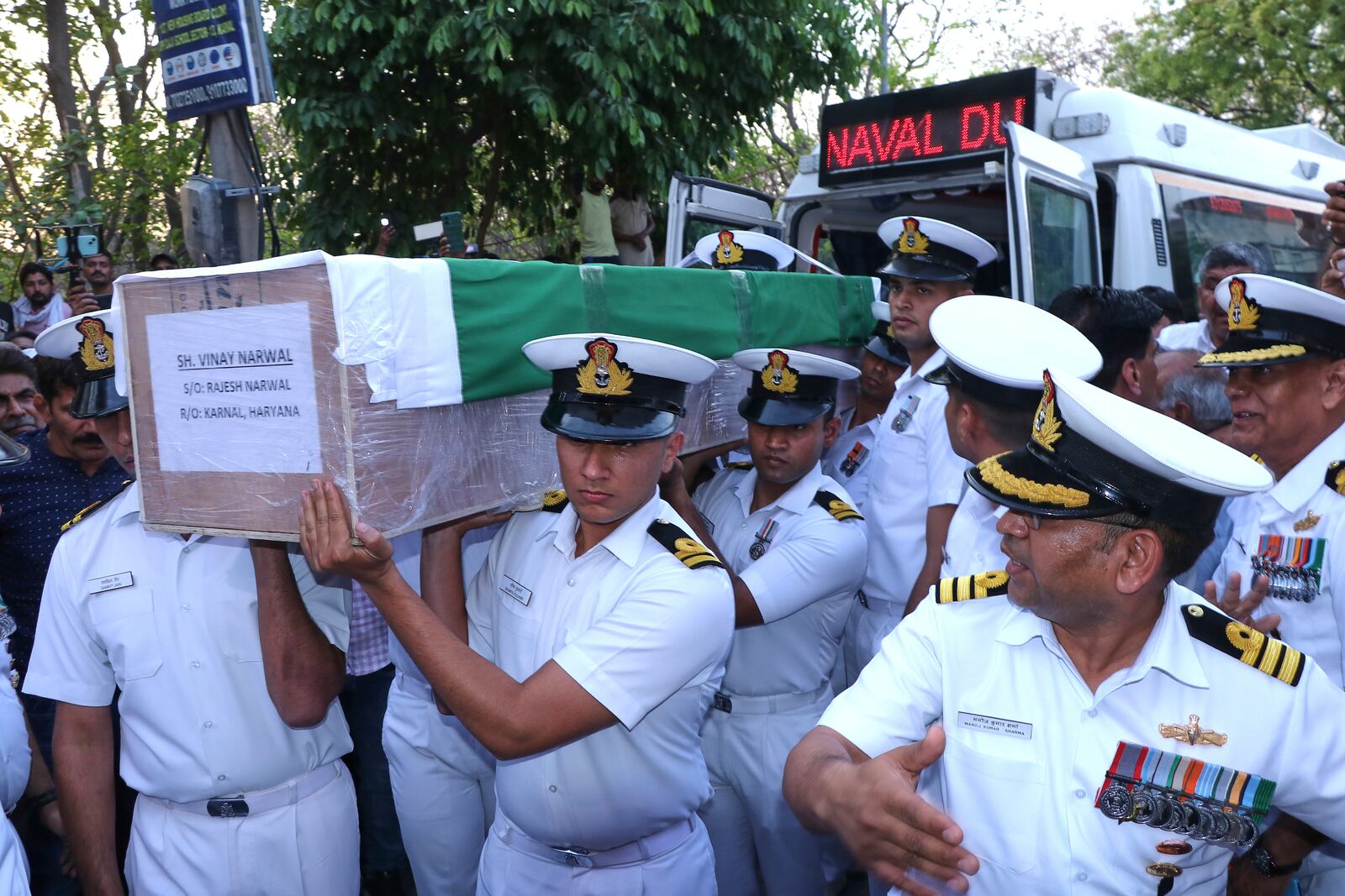 Indian naval officers carry a casket containing the body of their fellow officer Vinay Narwal, who was killed by militants at Pahalgam in Indian controlled Kashmir, during his funeral at Karnal, India, Wednesday, April 23, 2025. (AP Photo)