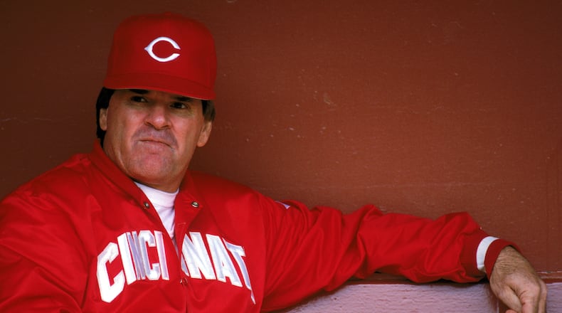 SAN FRANCISCO - 1989: Manager Pete Rose #14 of the Cincinnati Reds sits in the dugout during the game against the San Francisco Giants at Candlestick Park during the 1989 MLB season in San Francisco, California. (Photo by Otto Greule Jr./Getty Images)