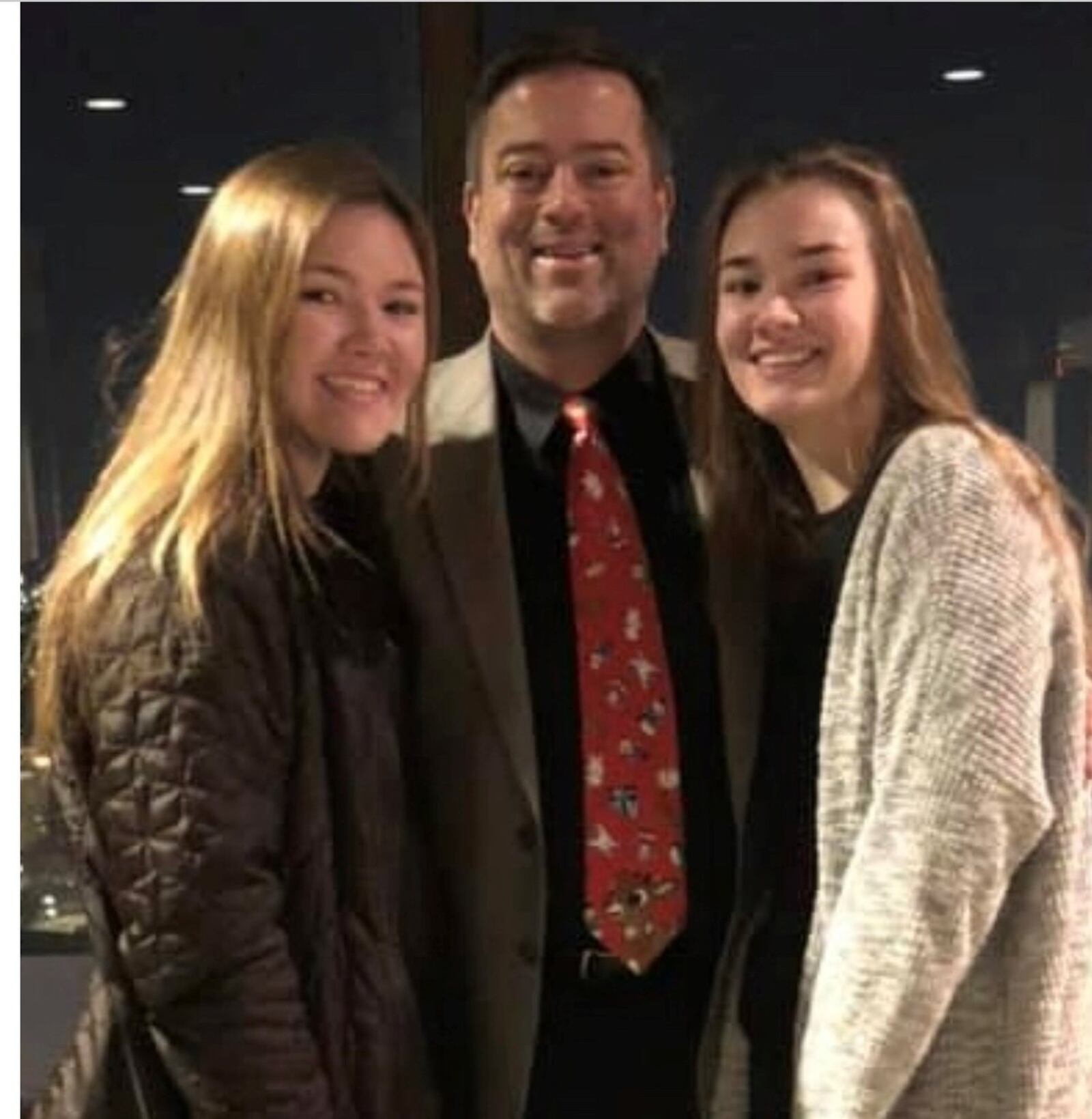 Jack Sperry flanked by two daughters, Emma Sperry (left), Jack Sperry, Alex Sperry (right). CONTRIBUTED