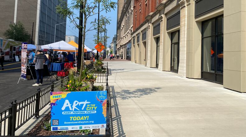 The Dayton Arcade's opening for self-guided, free tours was part of Art In the City, which was occurring simultaneously outside the building. Eileen McClory / Staff