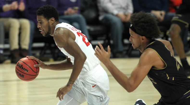 Dayton’s Xeyrius Williams dribbles against Northwestern. David Jablonski/Staff