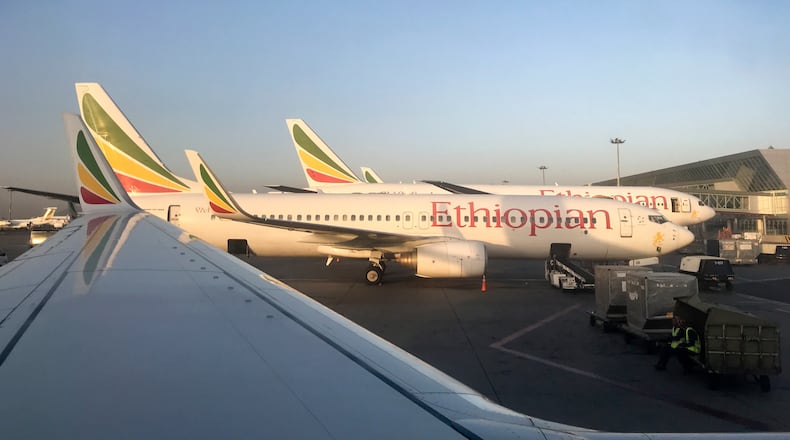 FILE - Ethiopian Airlines planes are parked at Bole International Airport in Addis Ababa, Ethiopia, Monday Feb. 11, 2019. (AP Photo/Ben Curtis, File)