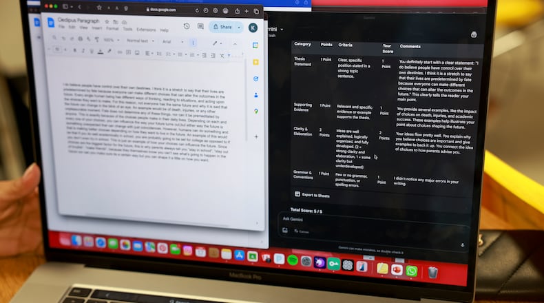 A laptop in a language art class where the teacher had students write argumentative paragraphs about free will and enter them into a Google chatbot that graded them on their arguments, at Southwest Miami High School, Miami, Fla., April, 2025. Schools in Miami-Dade County, the third largest school district in the U.S., and many others across the nation that initially banned the use of artificial intelligence chatbots are now beginning to embrace AI tools. (Ysa Pérez/The New York Times)