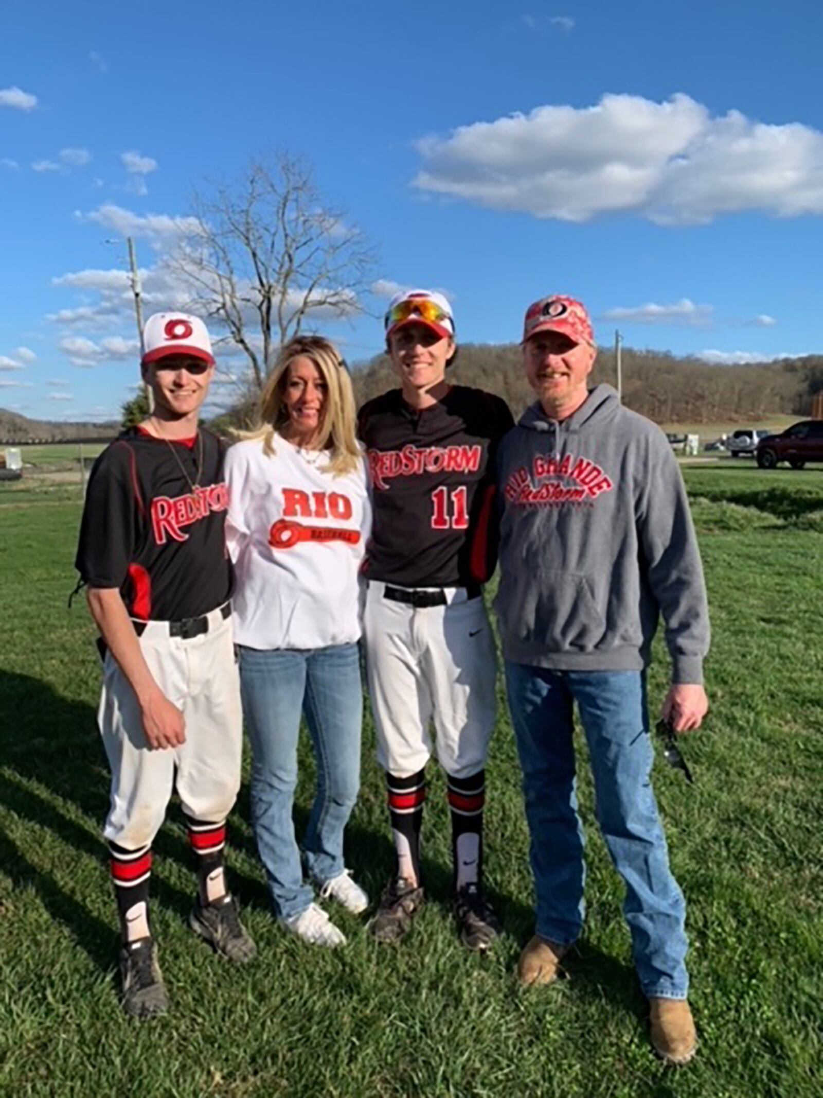 The Kendall family (L-R) Austin, Carrie, Zach and Matt. Both sons have attended college on baseball scholarships. Taken in February of 2024 at a baseball came in Rio Grande. This is Carrie's first outing with a full wig.