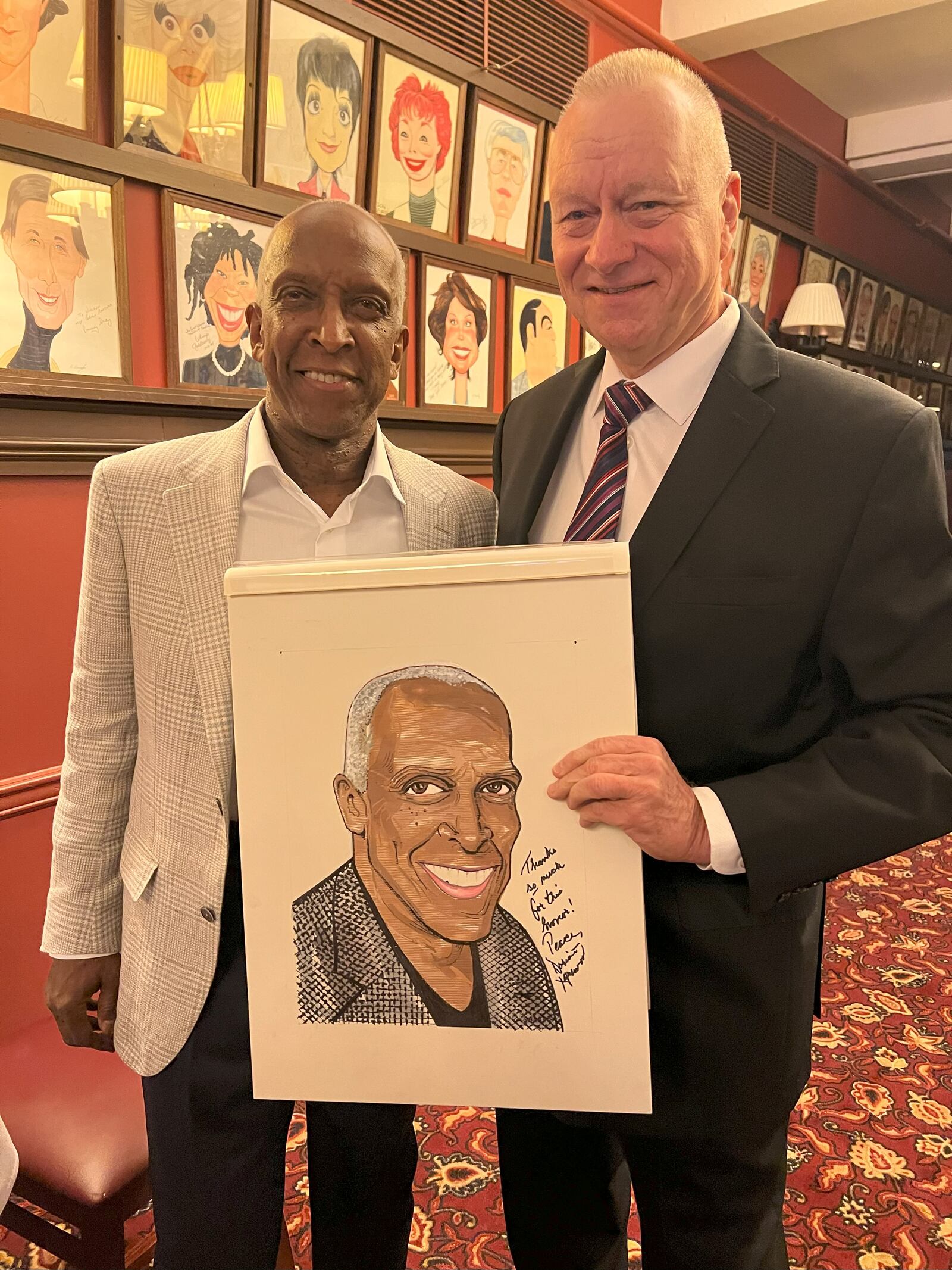 Dorian Harewood receives his caricature at New York's iconic Sardi's restaurant. CONTRIBUTED