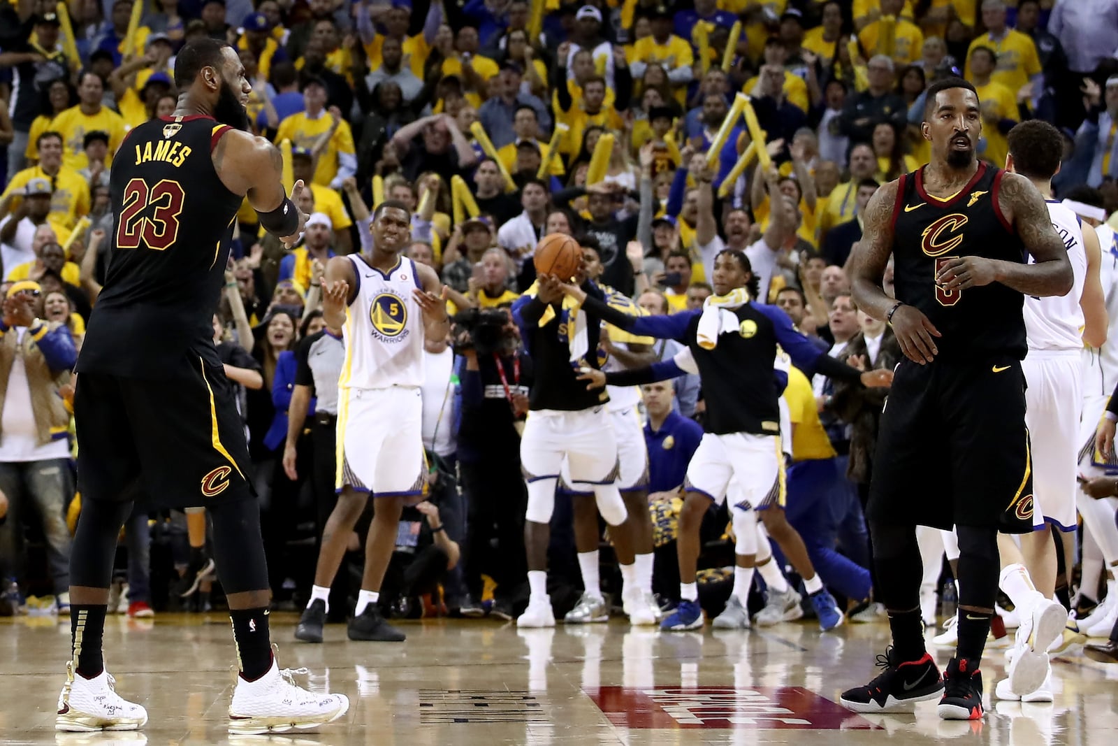 OAKLAND, CA - MAY 31: LeBron James #23 and JR Smith #5 of the Cleveland Cavaliers react as time expries in regulation against the Golden State Warriors  in Game 1 of the 2018 NBA Finals at ORACLE Arena on May 31, 2018 in Oakland, California. NOTE TO USER: User expressly acknowledges and agrees that, by downloading and or using this photograph, User is consenting to the terms and conditions of the Getty Images License Agreement.  (Photo by Ezra Shaw/Getty Images)