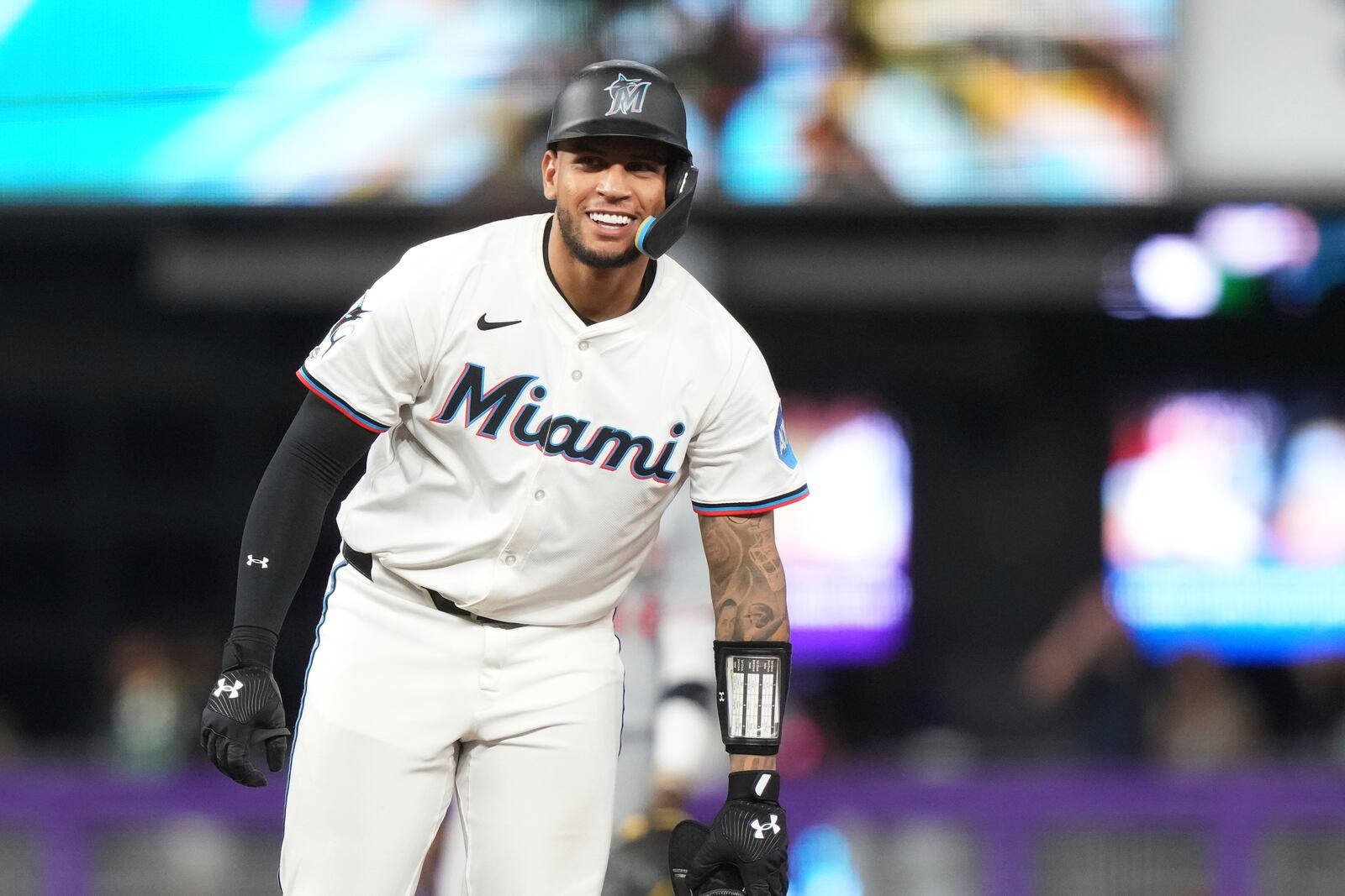 Miami Marlins' Agustin Ramirez reacts after hitting a double during the seventh inning of a baseball game against the Cincinnati Reds, Monday, April 21, 2025, in Miami. (AP Photo/Lynne Sladky)