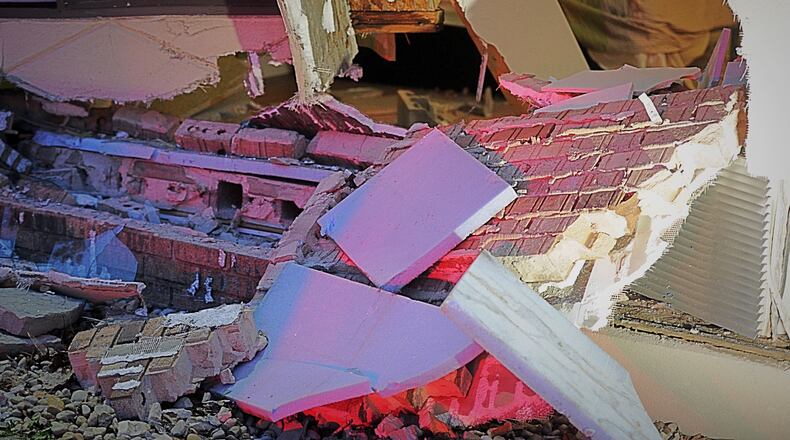 An SUV struck a Springfield Motel 6 room on Leffel Lane on Sunday evening. No one was seriously injured in the incident. MARSHALL GORBY/STAFF