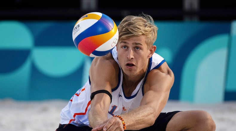 FILE - Netherlands' Steven Van De Velde hits the ball during the men's Pool B beach volleyball match between Norway and the Netherlands at Eiffel Tower Stadium at the 2024 Summer Olympics, Aug. 2, 2024, in Paris, France. (AP Photo/Louise Delmotte, File)