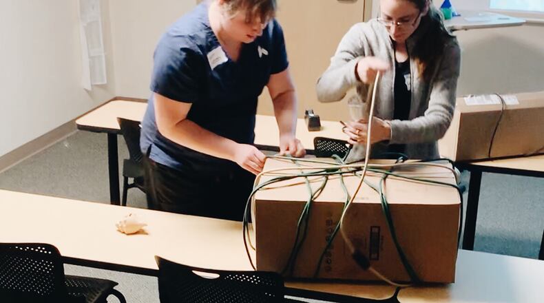 Students worked in pairs using concepts from their curriculum to complete puzzles to determine the best way to care for a patient in an interactive format — an escape room. Photo by Taryn Talbott