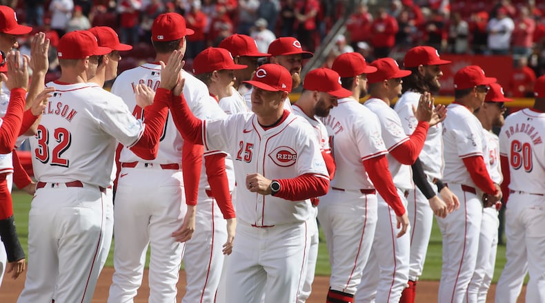 Reds manager David Bell is introduced on Opening Day before a Reds game against the Nationals on Thursday, March 28, 2024, at Great American Ball Park in Cincinnati. David Jablonski/Staff