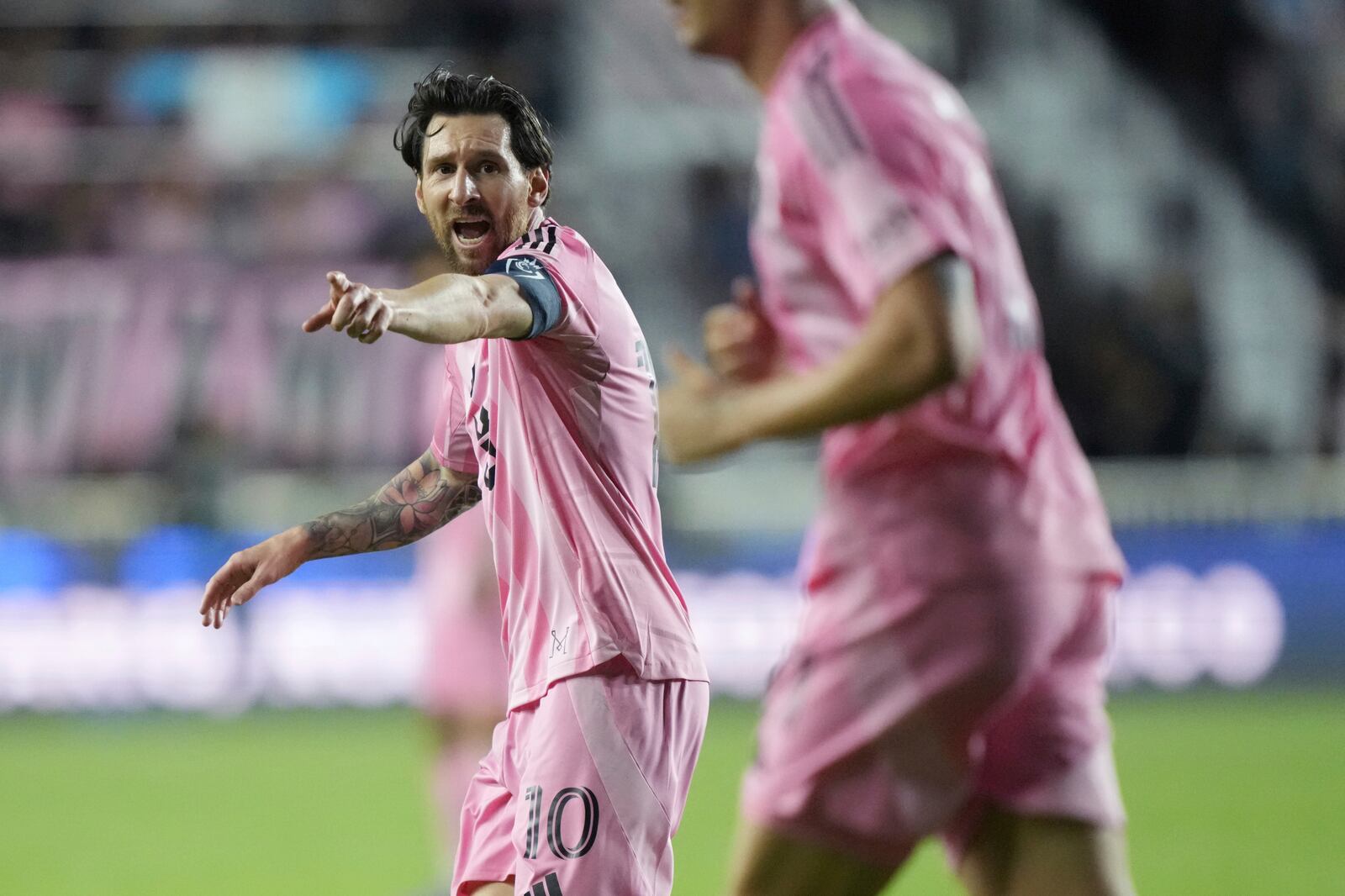 Inter Miami forward Lionel Messi (10) directs his team against the Los Angeles FC during the first half of a CONCACAF Nations League Quarterfinal Match at Chase Stadium, Wednesday, April 9, 2025 in Fort Lauderdale, Fla. (AP Photo/Jim Rassol)