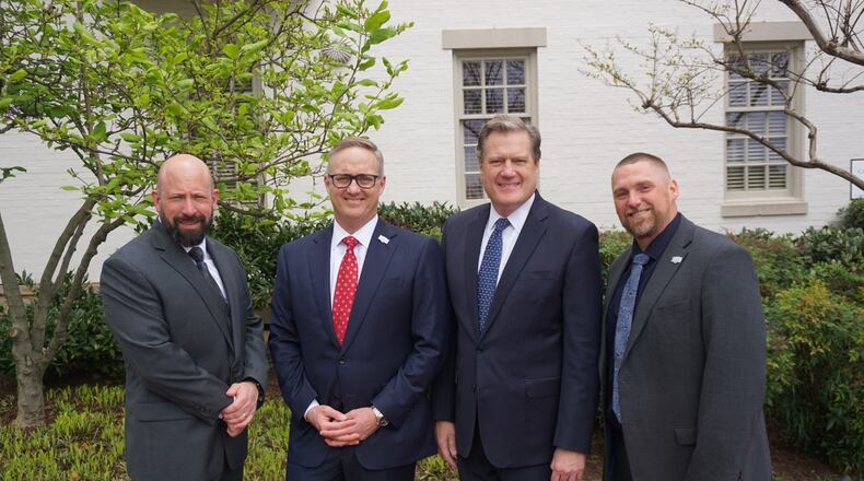 City leaders deputy director of public safety and operations Jason Via (far left), Mayor Rob Rue (second from left) and city manager Bryan Heck (far right) met with U.S. Rep. Mike Turner (second from right) Thursday in Washington, D.C. to discuss how the federal government can help Springfield with its growing Haitian population. JEFF NAFT/TURNER COMMUNICATIONS