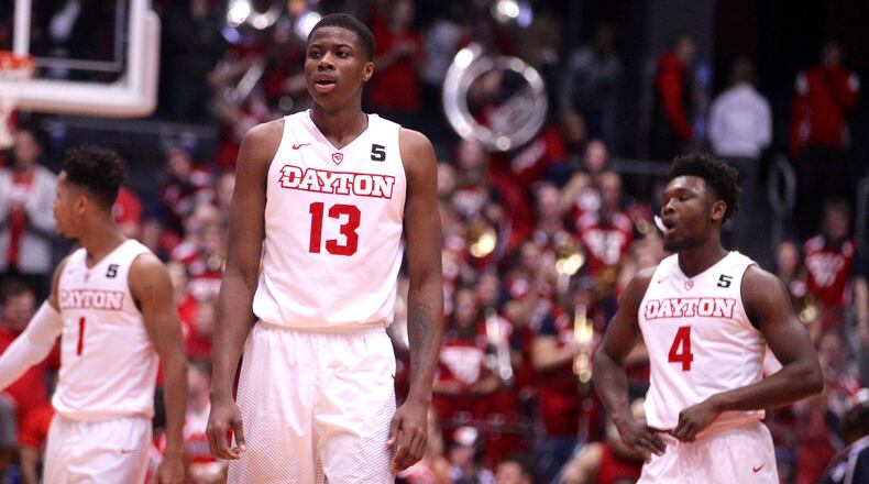 Dayton players, including Kostas Antetokounmpo, react after a loss to Auburn on Wednesday, Nov. 29, 2017, at UD Arena. David Jablonski/Staff
