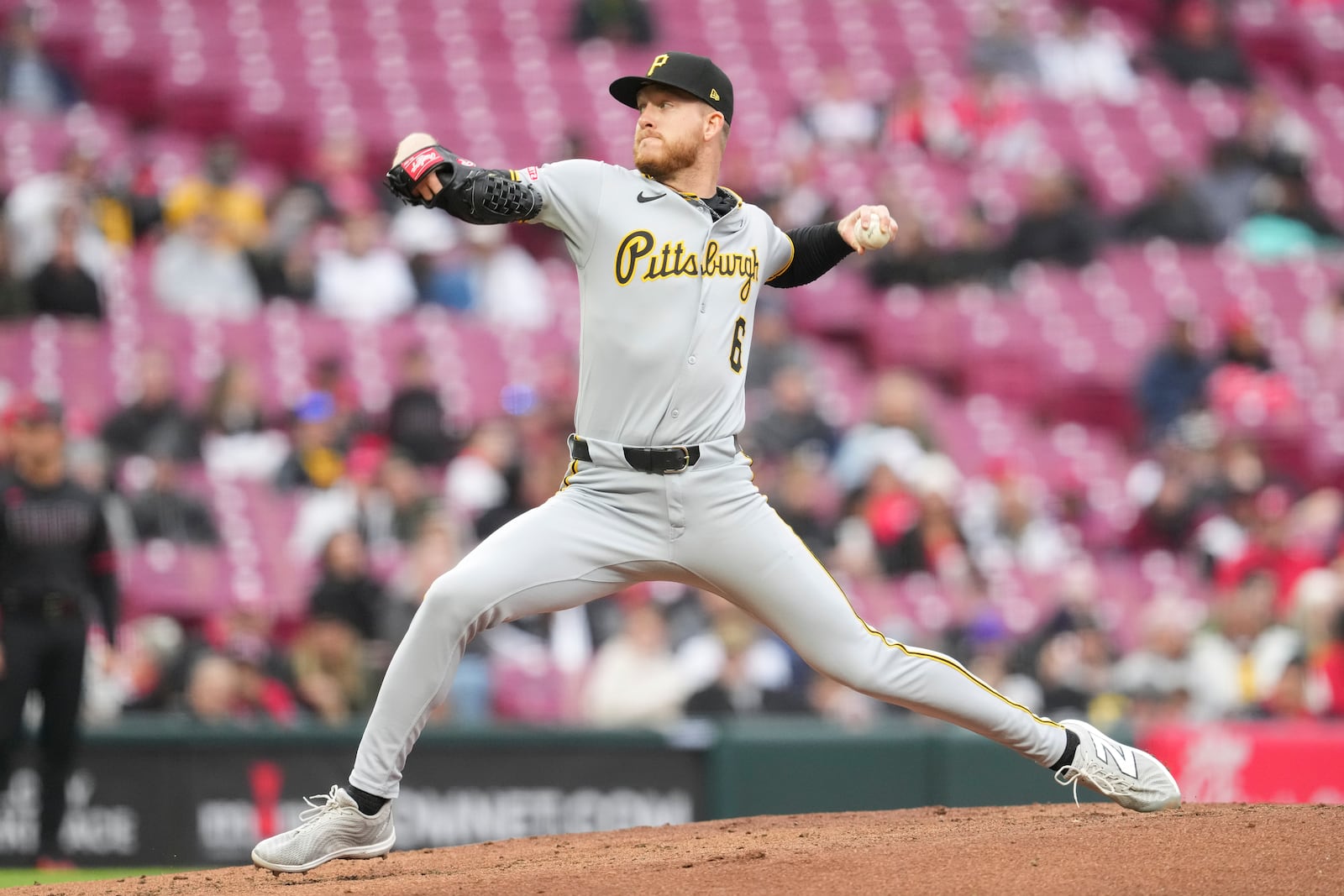 Pittsburgh Pirates pitcher Bailey Falter throws during the second inning of a baseball game against the Cincinnati Reds, Friday, April 11, 2025, in Cincinnati. (AP Photo/Jeff Dean)