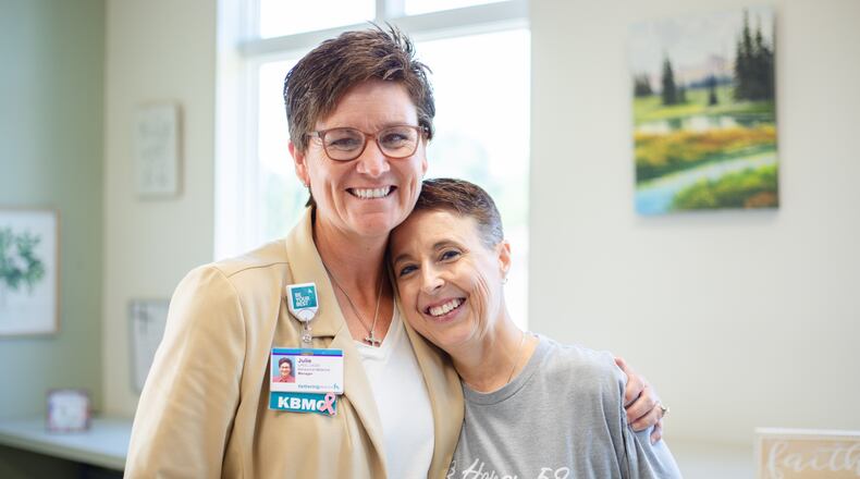 Chris Williford, of Miamisburg, (right) and Julie Manuel, clinical program manager at Kettering Health Behavioral Medical Center and manager of the center's intensive outpatient program. Williford, a survivor of the 2017 Route 91 Harvest Music Festival mass shooting in Las Vegas, participated in the intenstive outpatient program to help her cope with PTSD. COURTESY OF KETTERING HEALTH