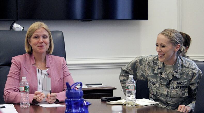 Lauren Knausenberger (left), director of Cyberspace Innovation, and 1st Lt. Jessica Farris, program manager and engineer, Air Force Life Cycle Management Center, Agile Combat Support Directorate, participate in a panel discussing women in technology during the Air Force Conference at the Pentagon July 19. AFCON is a one-day immersion into Air Force technology, culture and operations designed for long-form storytellers who typically do not cover the military. (U.S. Air Force photo/Svetlana Bilenkina)