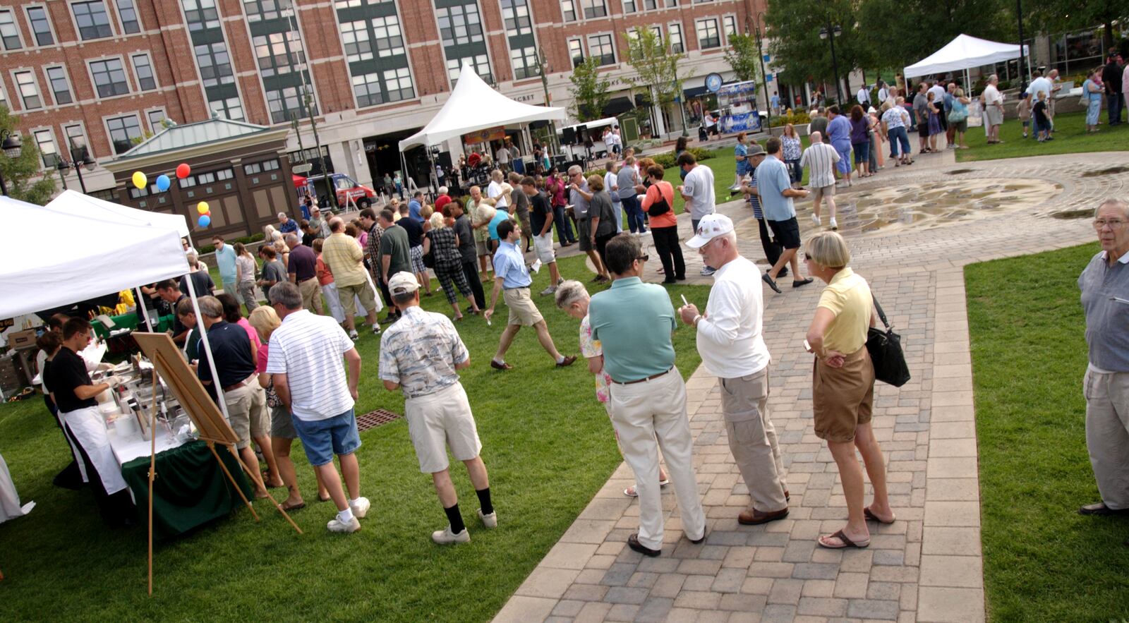 As soon as it opened, there were lines to the vendors during the 3rd Annual The Taste of The Greene in the Town Square at The Greene in Beavercreek, Thursday, August 13, 2009.