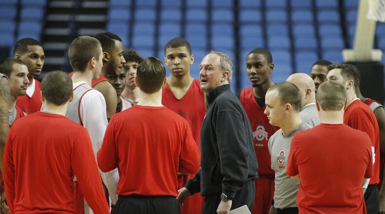Ohio State’s coach Thad Matta, center, gathers the team in a huddle before practice for the NCAA tournament on Wednesday, March 19, 2014, at First Niagara Center in Buffalo, N.Y. David Jablonski/Staff